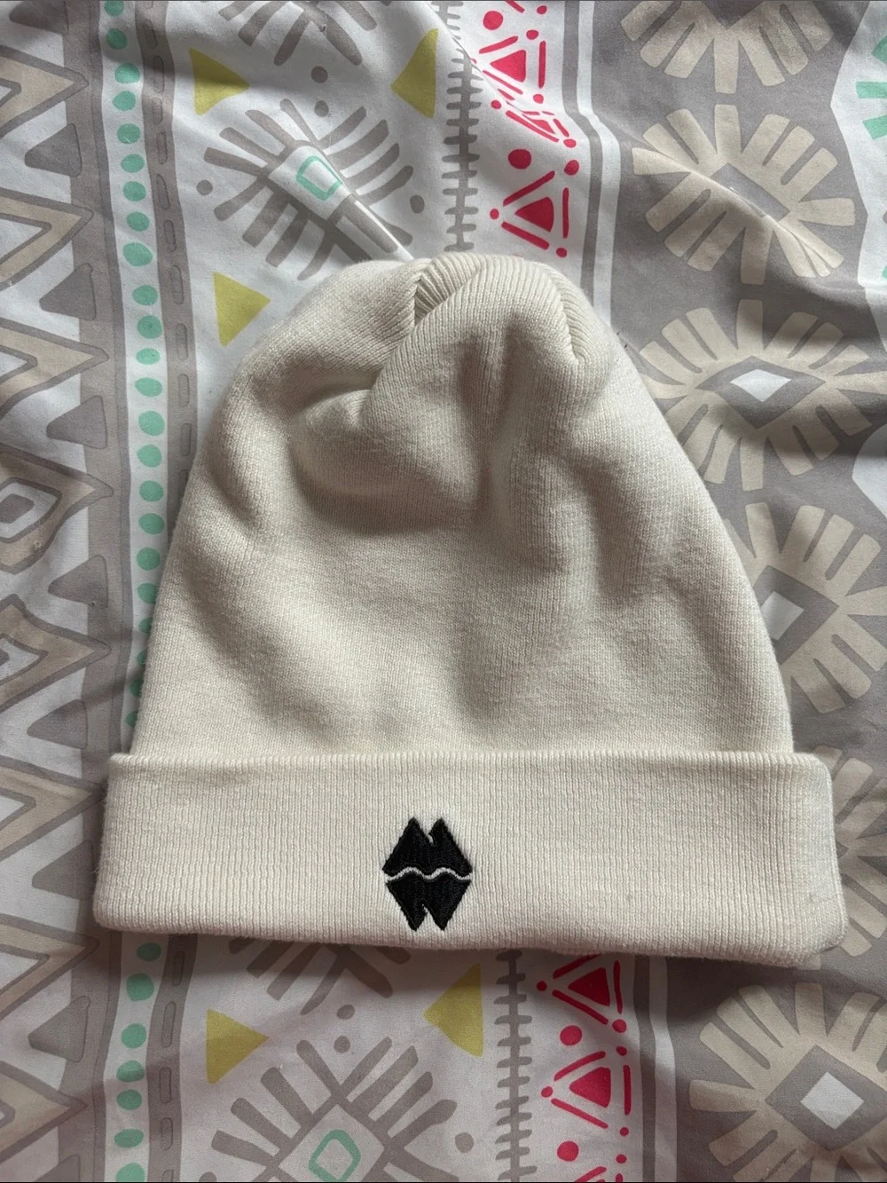 Omega Mart/Meow Wolf Cream Knit Beanie with Black Embroidered Cow